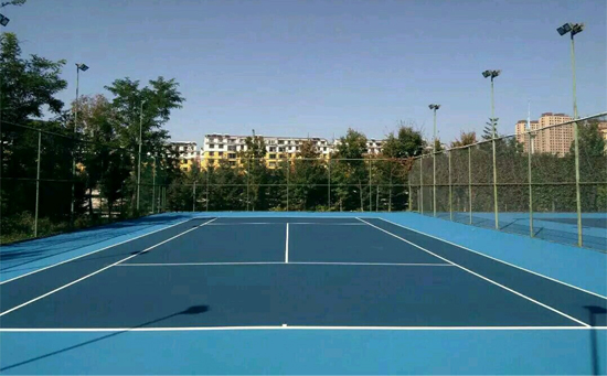 藍(lán)色塑膠網(wǎng)球場地圖片